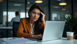 © My Ai - Business beautiful young woman of Hispanic descent, looking overwhelmed while typing on her laptop in a sleek office