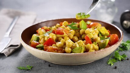 Wall Mural - chickpea salad with avocado and tomatoes