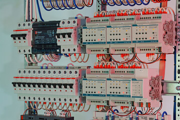 An electric switchboard for the organization of electricity supply to the apartment. Close-up. Soft focus.