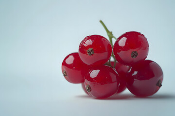 Fresh Red currant berries with leaf on White Background