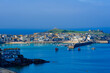 © Steven Bramall - Late afternoon sun lights up the town of St Ives, Cornwall in September.