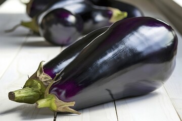 Fresh eggplants on the table