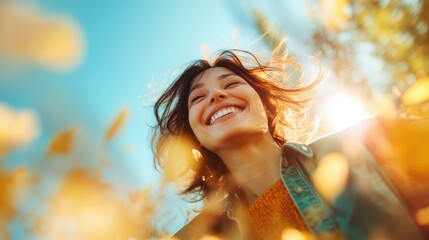 A joyful woman smiles brightly in a sunlit field, capturing the essence of happiness and nature's beauty with her carefree expression and vibrant surroundings.