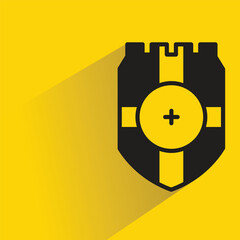 Wall Mural - shield badge with shadow on yellow background