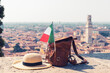 hat, backpack and italian flag. Travel, tour tourism, adventure in Italy