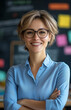 © aciddreamStudio - short-haired teacher 42 years old woman in front of her blackboard
