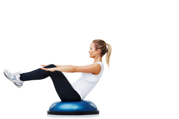 Aufkleber - She loves working out and staying fit. A young woman balancing on a bosu-ball.