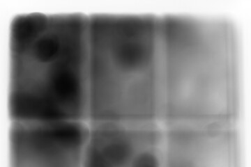 Wall Mural - a blurry dreamy close up of a door in black and white film negative.
