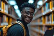 © Digi ART - African american student guy using laptop computer and smiling, standing in library interior, vibrant scene capturing the positive intersection of technology and, Generative AI