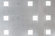 © hiv360 - cassette stretched or suspended ceiling with square halogen spots lamps and drywall construction in empty room in house or office. Looking up view