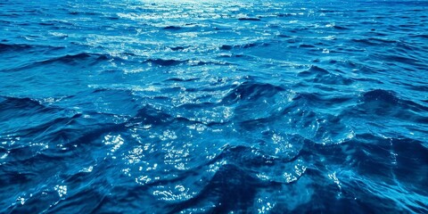 Poster - The ocean is calm and blue with a few ripples