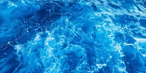 Poster - The image is of a large body of water with blue waves