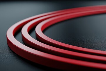 Wall Mural - close-up view of three red circular shapes on a sleek black surface, showcasing texture and design, 