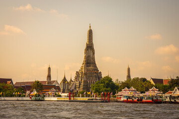 Wat Arun with the Chao Phraya River in front of it is a popular destination for tourists around the world. Bangkok Thailand