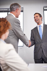 Canvas Print - Happy, meeting and business people with handshake in office for partnership, consultation and deal. Director, negotiation and shaking hands with subsidiary for merger, agreement and b2b acquisition