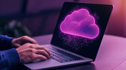 A person types on a laptop with a vibrant, digital cloud graphic displayed on the screen, symbolizing cloud computing and data storage.