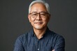 © James - Portrait smile handsome senior mature Asian man isolated background, Generative AI