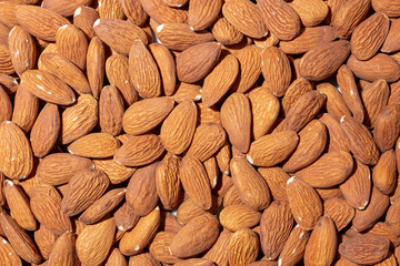 Scattered Almonds. Background from Almond Nuts. Natural High-Calorie Snacks