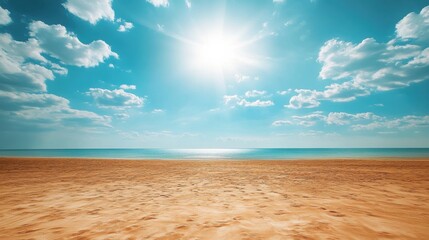 Deserted beach under intense sunlight during a heatwave with clear skies and calm ocean