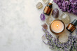 © kristina - Lavender essential oil and various essential oils bottles arranged on a wooden table, setting the scene for aromatherapy and relaxation.