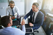 © ThurstanJam/peopleimages.com - Business people, finance investor or handshake in meeting for funding, teamwork or partnership. Collaboration, agreement or investment banker greeting manager for financial help or negotiation deal