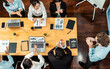 © InfiniteFlow - Panorama top view diverse group of business analyst team analyzing financial data report paper on meeting table. Chart and graph dashboard by business intelligence analysis. Meticulous