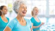 © mashimara - Smiling elderly woman in colorful swimwear, enjoying water fitness class, concept of active aging