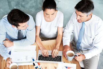 Group, discussion and business people with laptop, data and stats above. Computer, team manager and financial analyst with chart, planning and brainstorming ideas for company performance increase