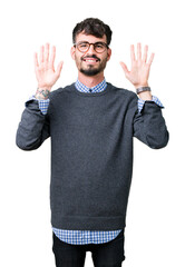 Wall Mural - Young handsome smart man wearing glasses over isolated background showing and pointing up with fingers number ten while smiling confident and happy.