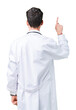 © Krakenimages.com - Young doctor man wearing hospital coat over isolated background Posing backwards pointing behind with finger hand