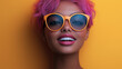 © Prompt World - Playful woman with pink hair and orange sunglasses posing against yellow background