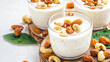 © Luluraschi - protein-rich breakfast setting with creamy yogurt and mixed nuts