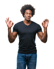 Wall Mural - afro american man over isolated background relax and smiling with eyes closed doing meditation gestu