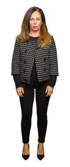 Wall Mural - beautiful middle age woman wearing fashion jacket skeptic and nervous, frowning upset because of pro