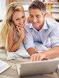© ArcursForPI/peopleimages.com - Laptop, happy and mature couple in house planning vacation with online budget together. Relax, computer and man and woman booking hotel, plane ticket or accommodation for holiday or weekend trip.