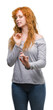 © Krakenimages.com - Young redhead woman disgusted expression, displeased and fearful doing disgust face because aversion reaction. With hands raised. Annoying concept.