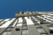 © New Africa - Exterior of modern building against blue sky, low angle view