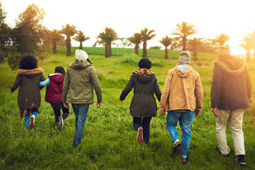 Aufkleber - Back, field and walking with group, adventure and bonding together with happiness. Outdoor, people and friends with nature, grass and environment with weekend break, vacation and holiday with joy