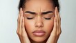 © Napasnan - Stressed face with hands holding the head, representing anxiety and mental health struggles, isolated on white background