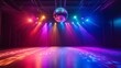 © InfiniteStudio - An empty dance floor illuminated by colorful lights from a disco ball creates a vibrant atmosphere for an evening celebration