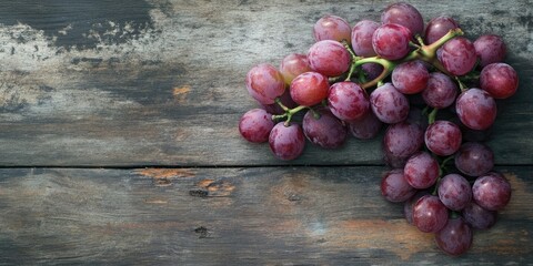 Poster - Red grapes on a wooden surface.
