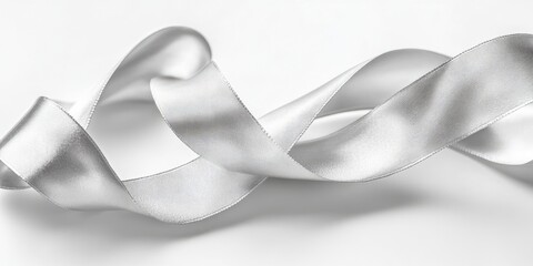 Aufkleber - Curled silver silk ribbon set against a white backdrop. Silver ribbon roll placed on a white background.