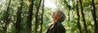 © carballo - senior woman breathing relaxed in the forest