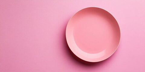 Aufkleber - Pink plate against a pink backdrop. Minimalist composition. Copy space, top view, flat lay.