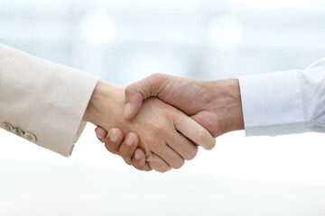 Sticker - Business people, handshake and meeting for welcome, deal or agreement together at the office. Closeup, employees and shaking hands in b2b support, thank you or partnership with teamwork at workplace