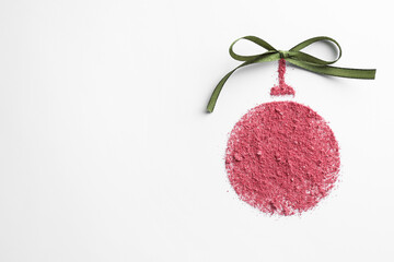 Wall Mural - Christmas ball made of blush with bow on white background, top view. Space for text