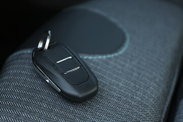 Wall Mural - Car flip key inside of modern automobile, closeup