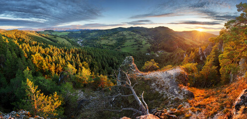 Poster - Sunset in nice mountain with sun, forest and rocks in Slovakia, summer landscape panorama - Hricov