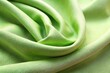 © Anulak - Macro light green synthetic fabric texture background