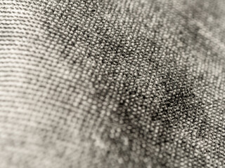 macro photography of fabric texture, detailing soft waves and patterns, creating an impression of ta